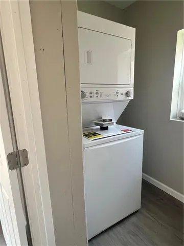 a utility room with washer and dryer