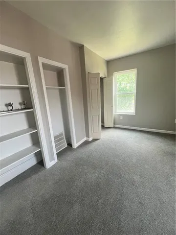 a view of empty room with front door