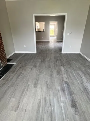 a view of livingroom with hardwood floor and window