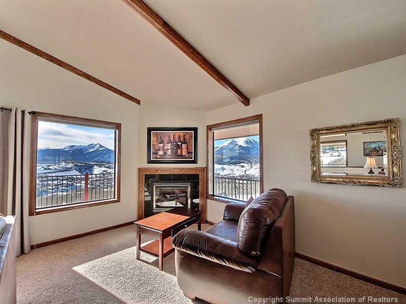 48 AB Road Silverthorne, CO 80498 - Photo 5 of 25 Living Room. Part of the Living area with the gas fireplace. Relax and sip a glass of Wine while taking those breath taking Views in!