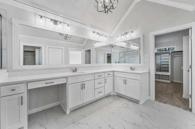 a room with cabinets and a wooden floor