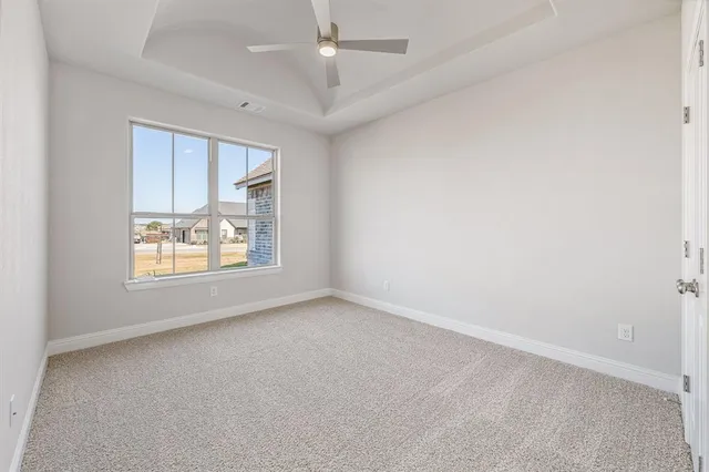 a bathroom with a sink toilet vanity and tub