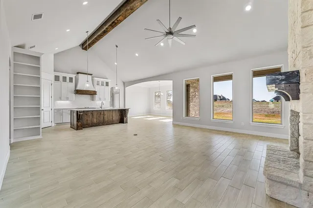 a view of kitchen with furniture and window