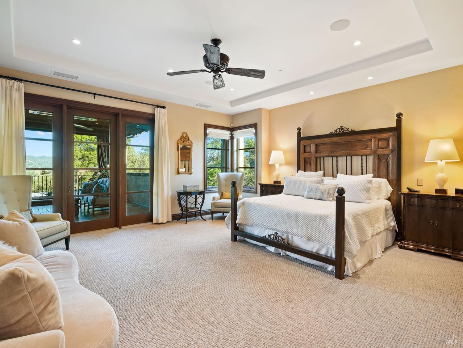 6444 Cottage Ridge Road Santa Rosa, CA 95403 - Photo 23 of 95 a spacious bedroom with a bed and large windows