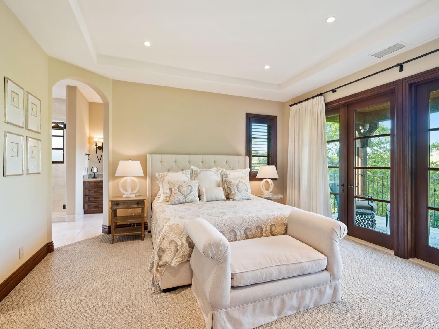 6444 Cottage Ridge Road Santa Rosa, CA 95403 - Photo 32 of 95 a bedroom with a large bed and a large window