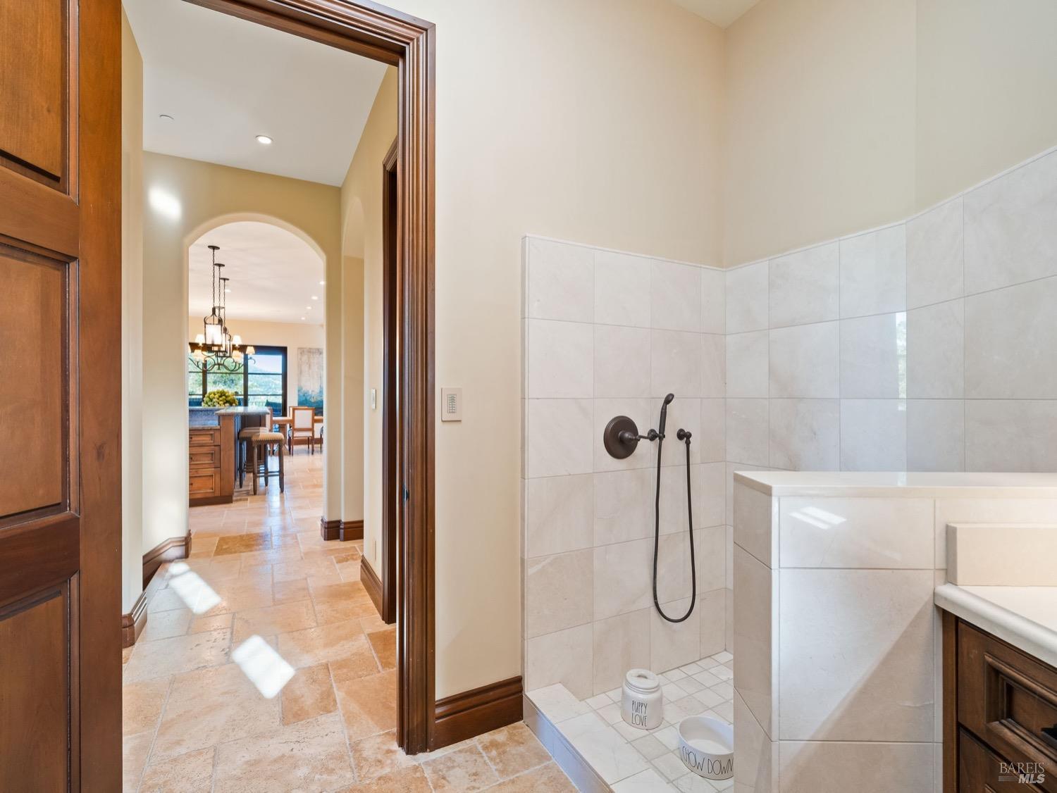 6444 Cottage Ridge Road Santa Rosa, CA 95403 - Photo 39 of 95 a bathroom with a glass shower door