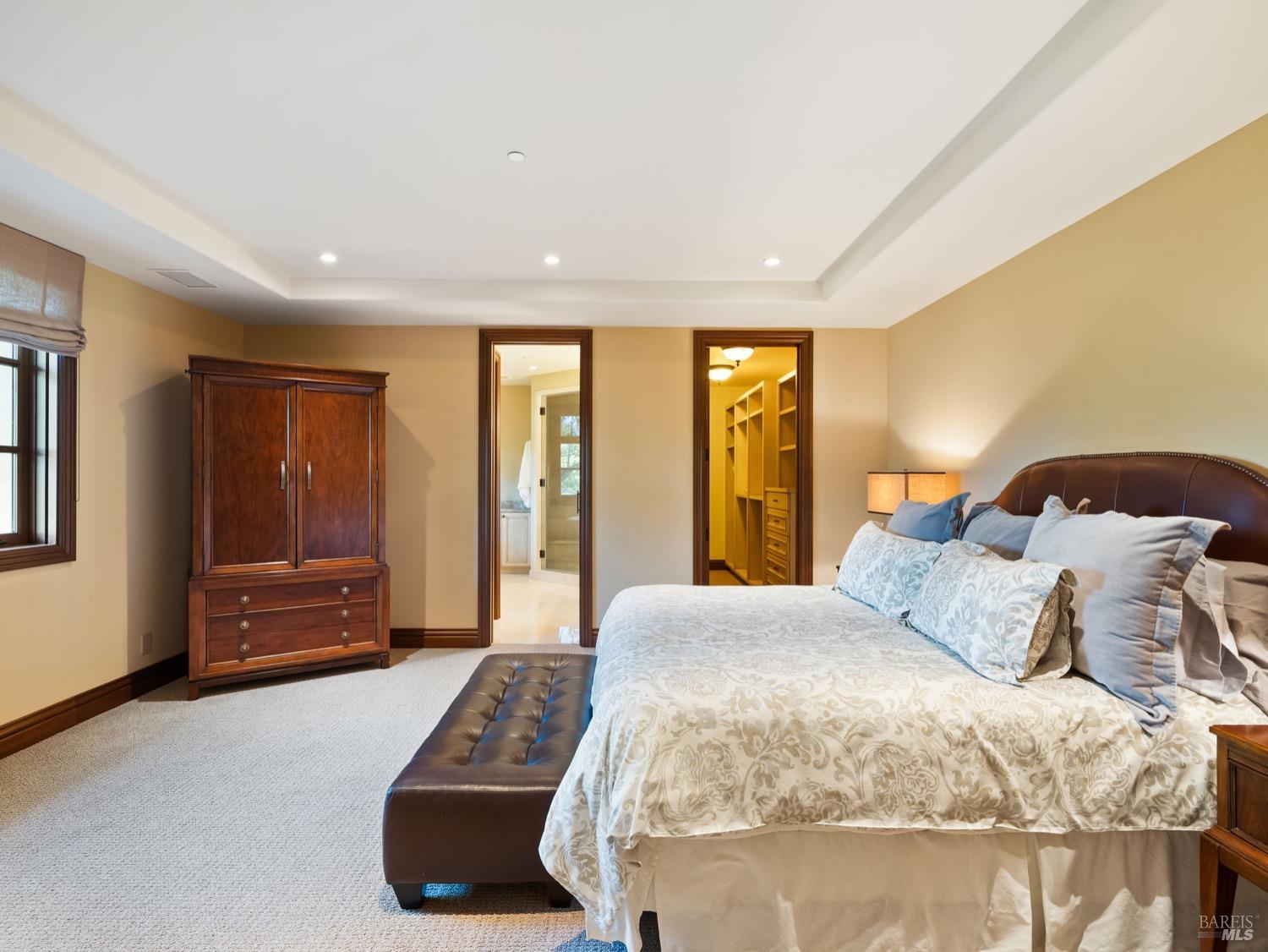 6444 Cottage Ridge Road Santa Rosa, CA 95403 - Photo 53 of 95 a bedroom with a large bed and a couch