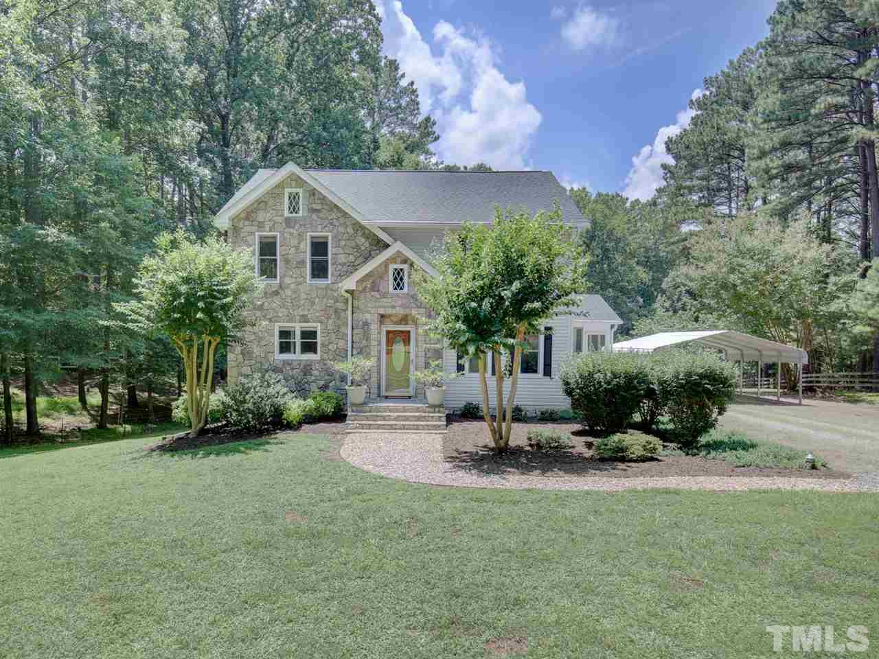 1829 Mt Vernon Church Road Raleigh, NC 27614 - Photo 1 of 30 a front view of a house with a yard