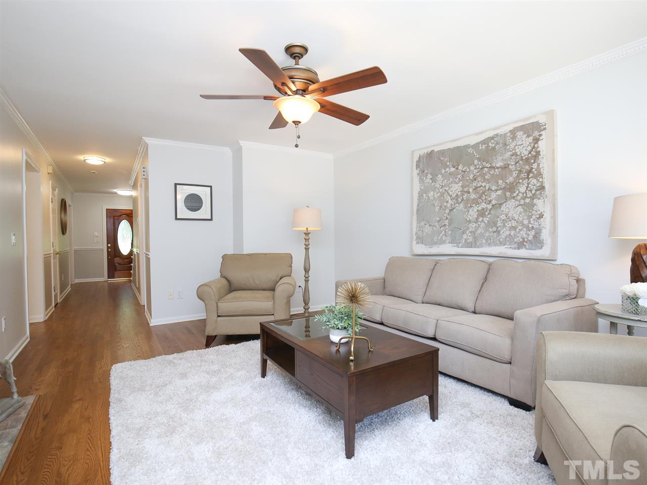 1829 Mt Vernon Church Road Raleigh, NC 27614 - Photo 18 of 30 a living room with furniture and a ceiling fan