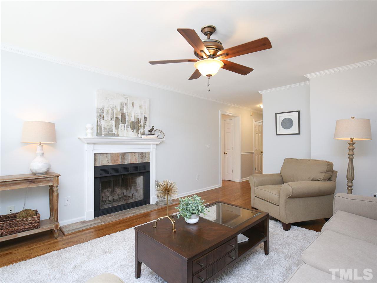 1829 Mt Vernon Church Road Raleigh, NC 27614 - Photo 19 of 30 a living room with furniture and a fireplace
