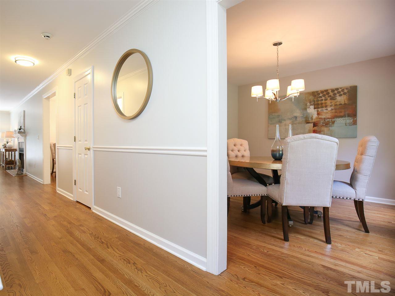 1829 Mt Vernon Church Road Raleigh, NC 27614 - Photo 3 of 30 a view of a dining room with furniture and wooden floor