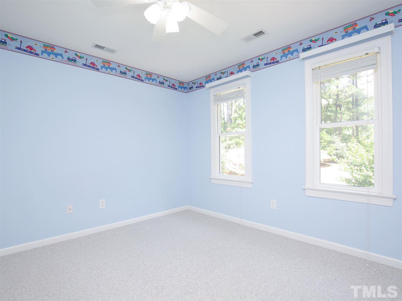 1829 Mt Vernon Church Road Raleigh, NC 27614 - Photo 23 of 30 a room with a window and ceiling fan