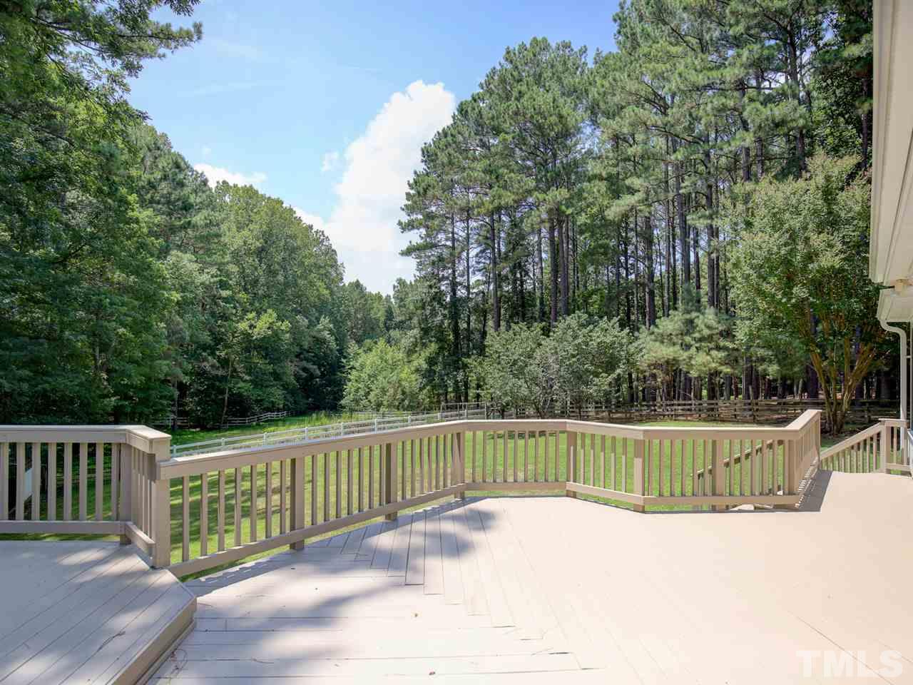 1829 Mt Vernon Church Road Raleigh, NC 27614 - Photo 30 of 30 a view of a fence and trees in the background
