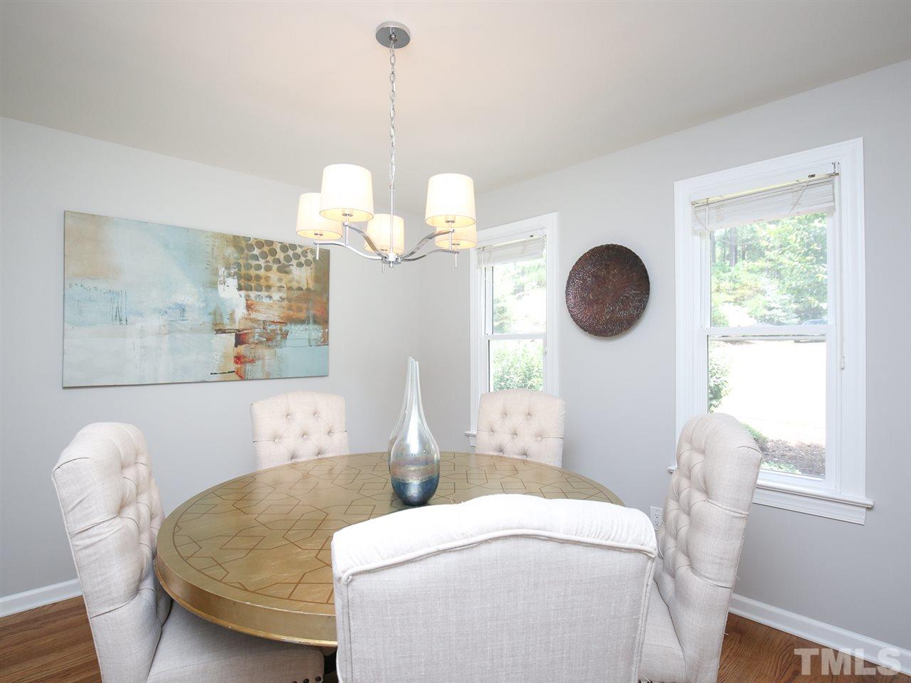 1829 Mt Vernon Church Road Raleigh, NC 27614 - Photo 4 of 30 a living room with furniture chandelier and a window