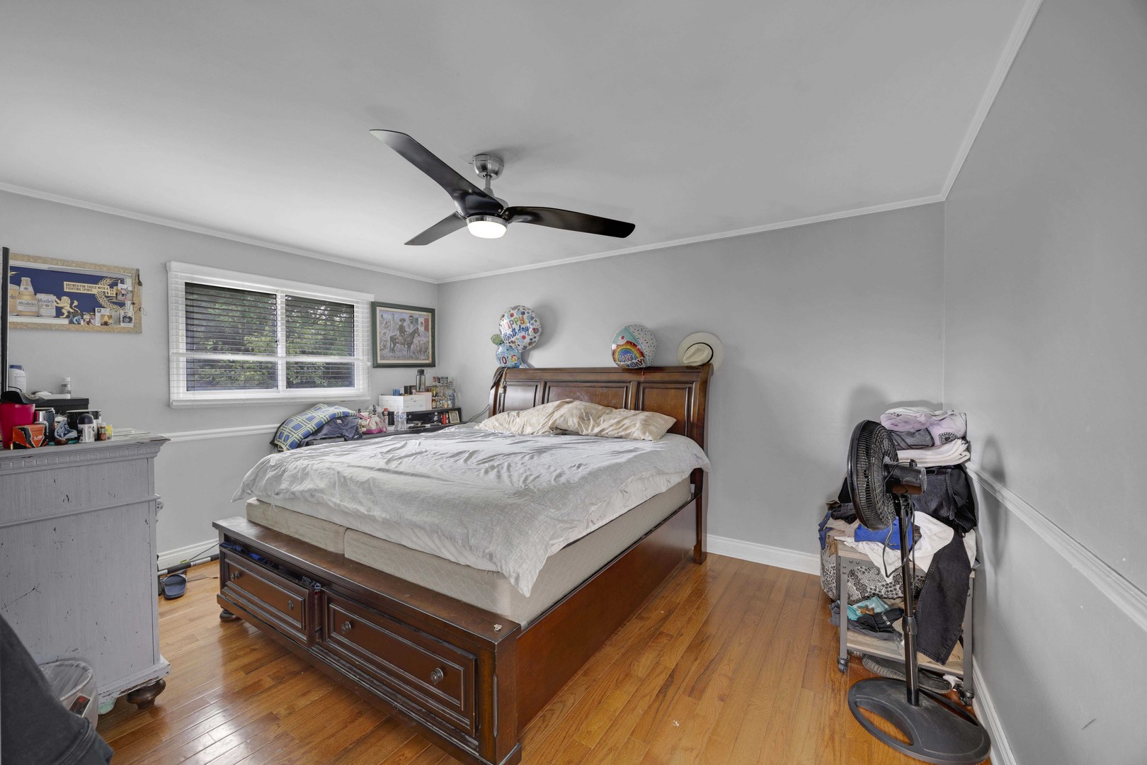 1943 182nd Street Lansing, IL 60438 - Photo 14 of 17 a bedroom with bed and a large window
