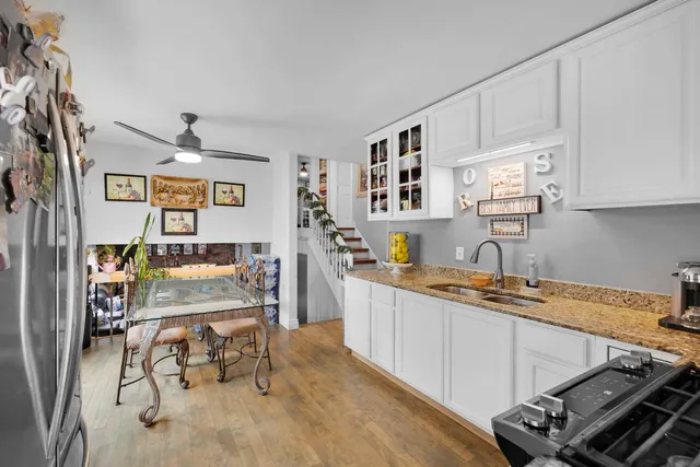 a kitchen that has a cabinets and a stove