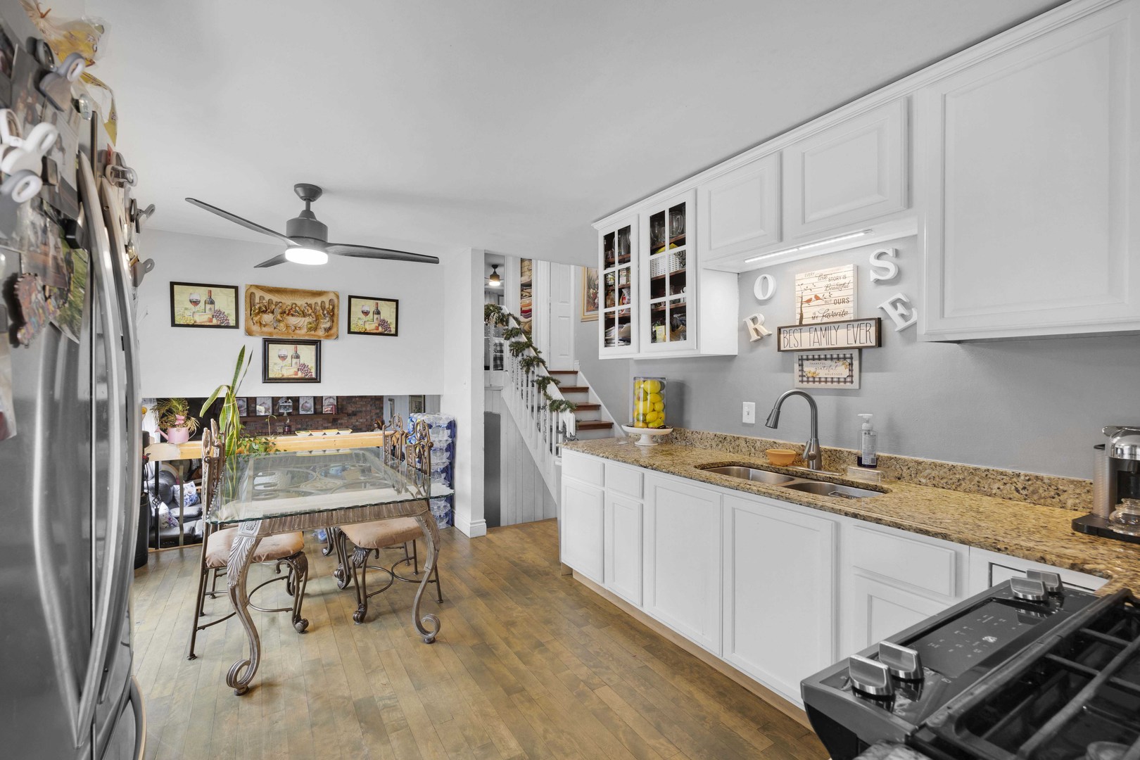 1943 182nd Street Lansing, IL 60438 - Photo 5 of 17 a kitchen that has a cabinets and a stove