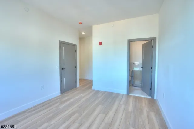 a view of hallway with closet