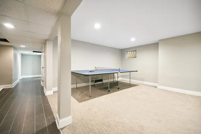 a view of a livingroom with furniture and wooden floor