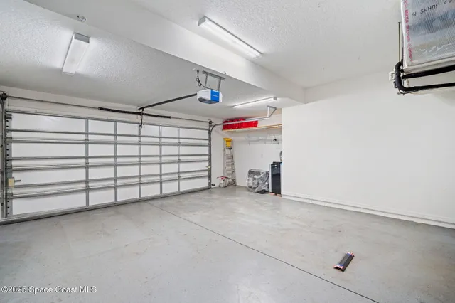 an aerial view of a house with a garden