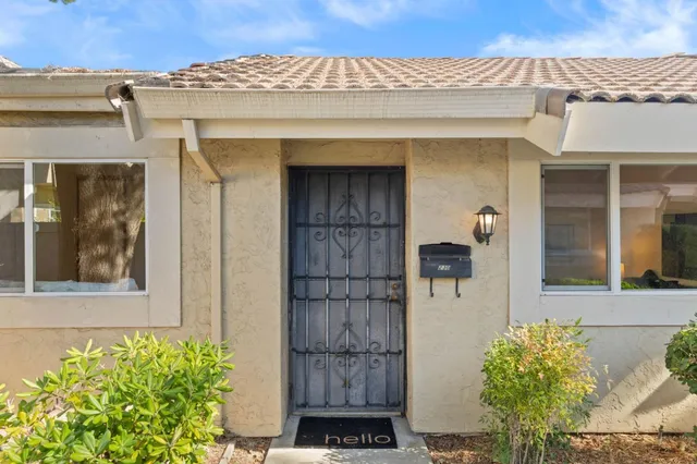 a front view of a house with a shower