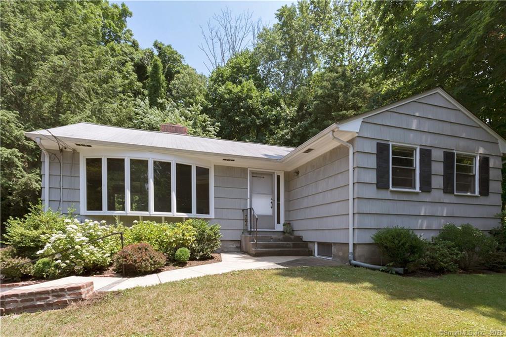 584 Old Stamford Road New Canaan, CT 06840 - Photo 1 of 1 front view of a house with a yard