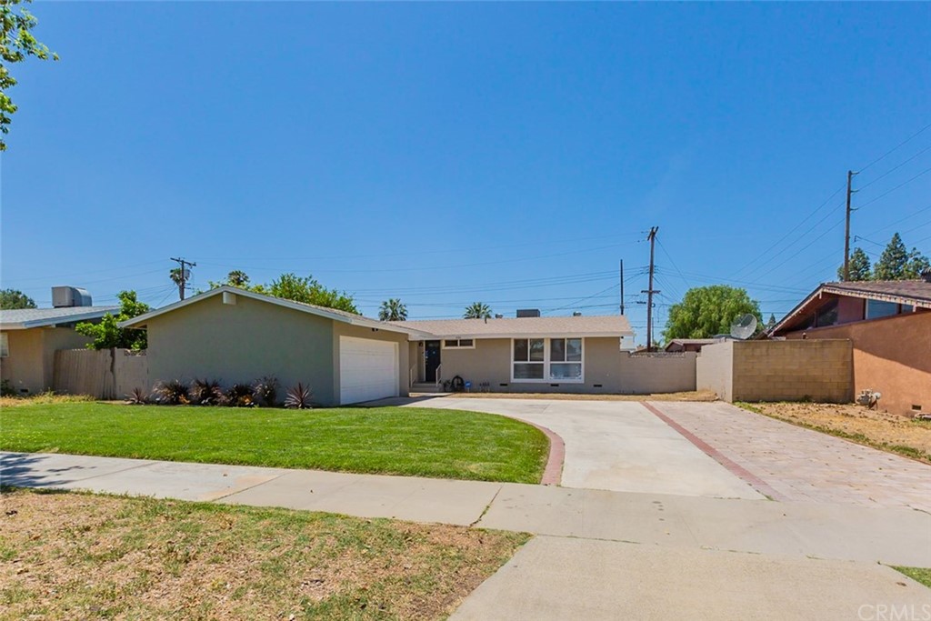 4184 Nessel Street Riverside, CA 92503 - Photo 1 of 1 a view of a house with a patio and a yard