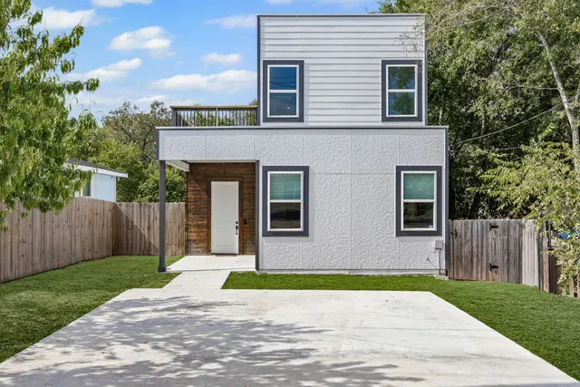 a front view of house with yard