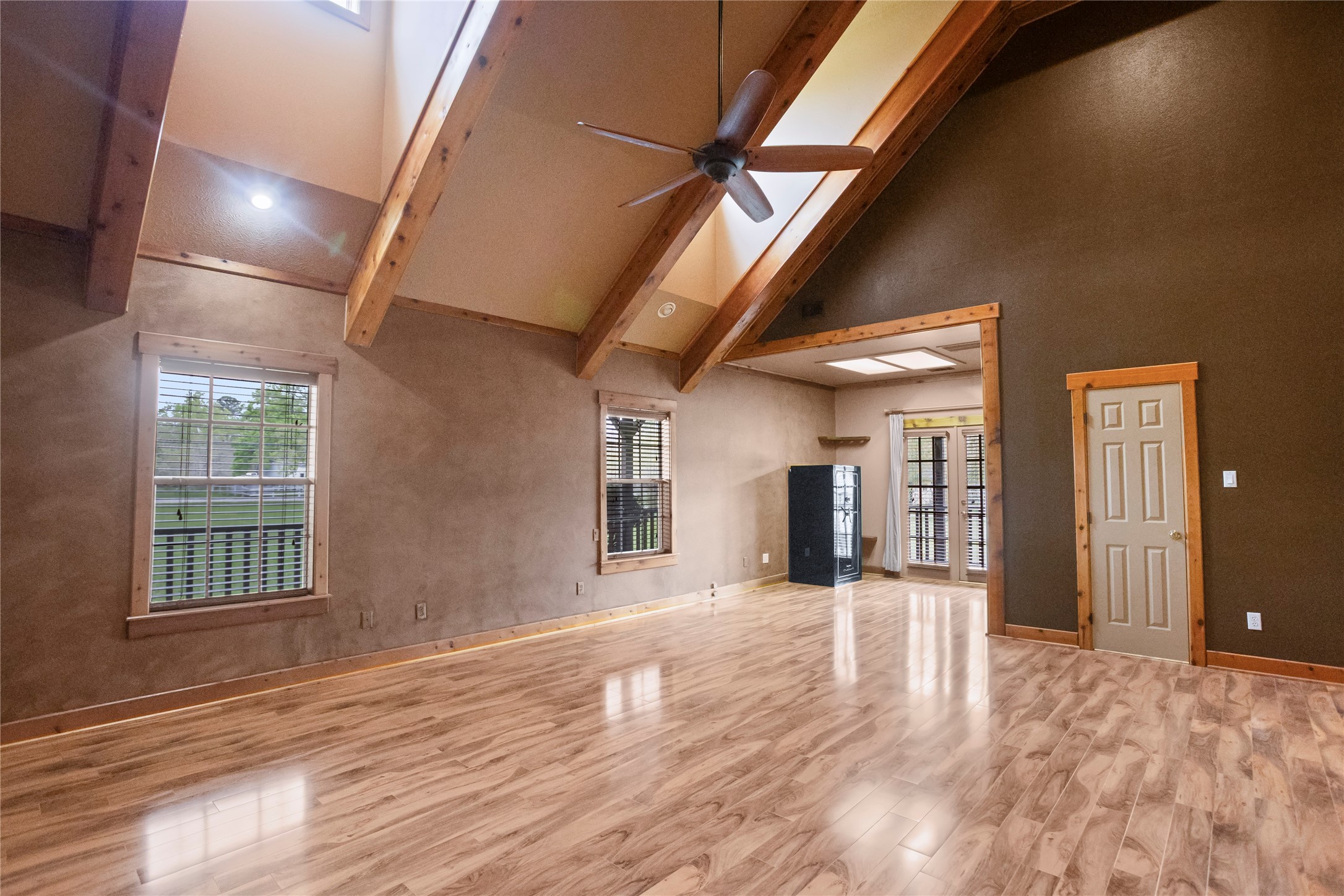 22916 East Martin Drive Porter, TX 77365 - Photo 20 of 43 a view of an entryway with wooden floor and a door