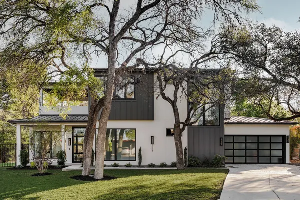 front view of a house with a yard