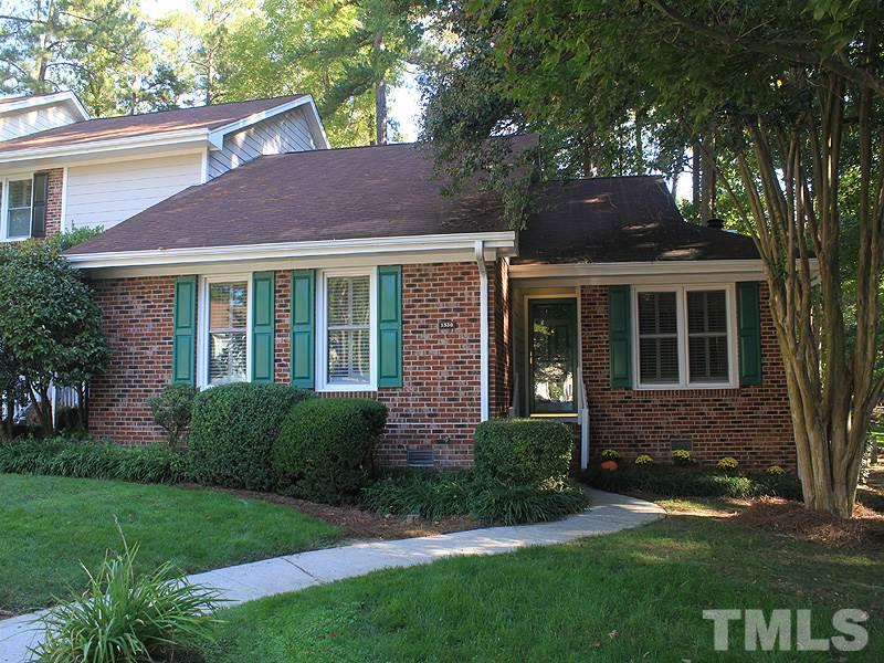 1530 Edgeside Court Raleigh, NC 27609 - Photo 1 of 20 a front view of a house with garden