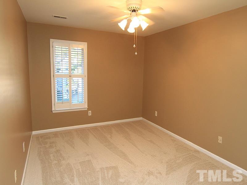 1530 Edgeside Court Raleigh, NC 27609 - Photo 12 of 20 an empty room with a window