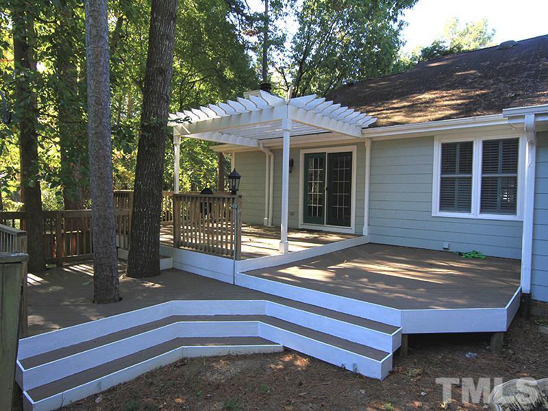 1530 Edgeside Court Raleigh, NC 27609 - Photo 16 of 20 a view of backyard with deck area and outdoor seating