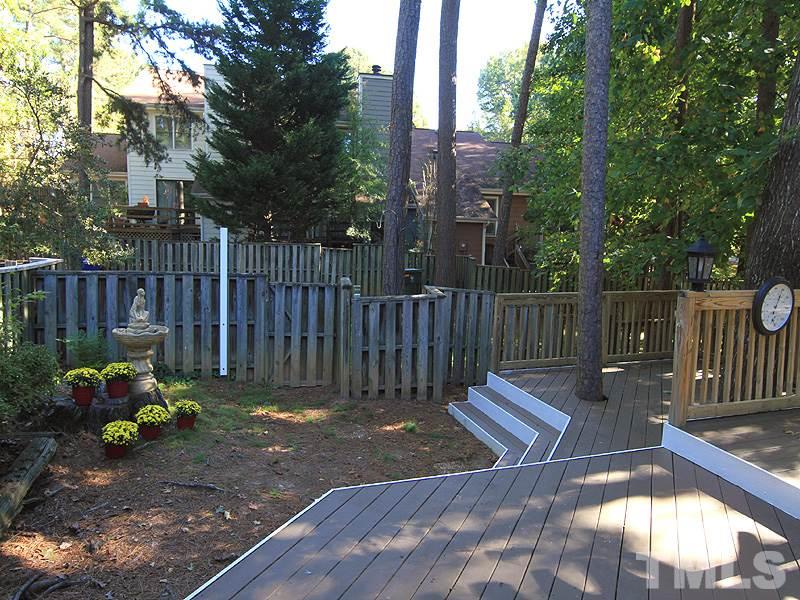 1530 Edgeside Court Raleigh, NC 27609 - Photo 18 of 20 a view of a bench in the backyard