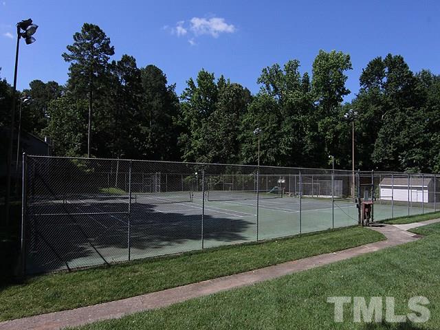 1530 Edgeside Court Raleigh, NC 27609 - Photo 19 of 20 a backyard of a house with lots of green space