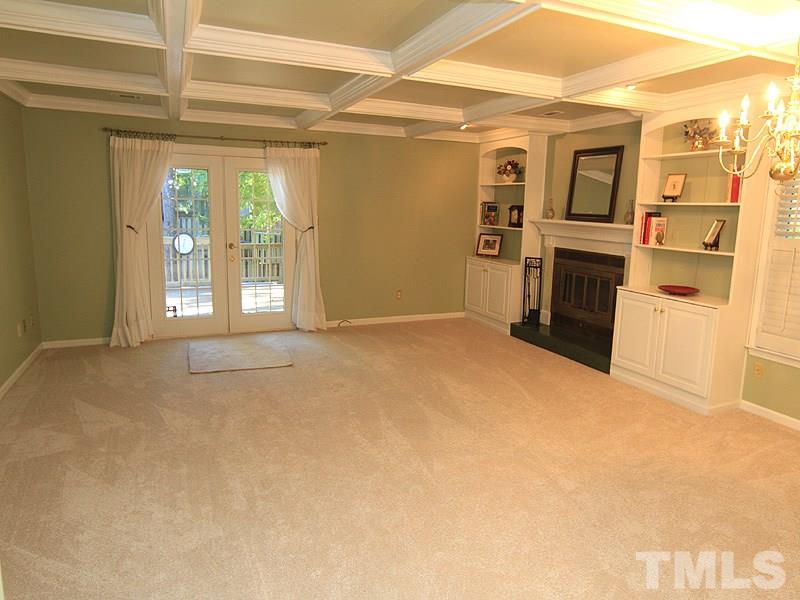 1530 Edgeside Court Raleigh, NC 27609 - Photo 7 of 20 a view of a big room with windows and cabinet