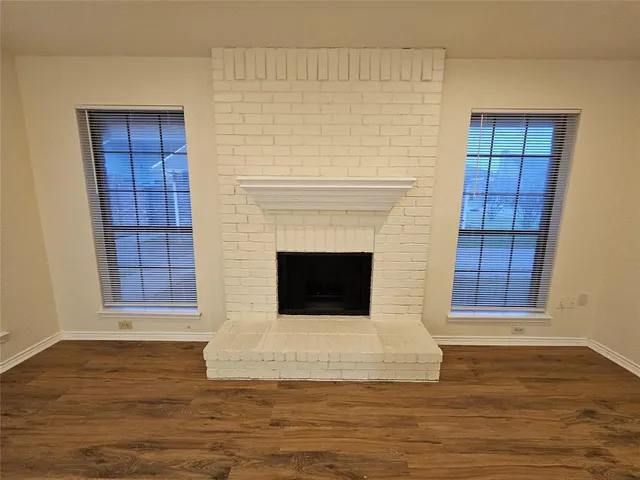 a view of a livingroom with a fireplace