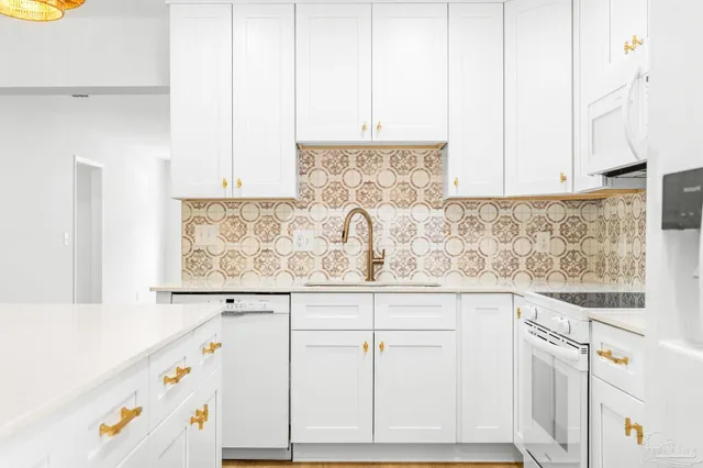 a view of kitchen with wooden floor and window