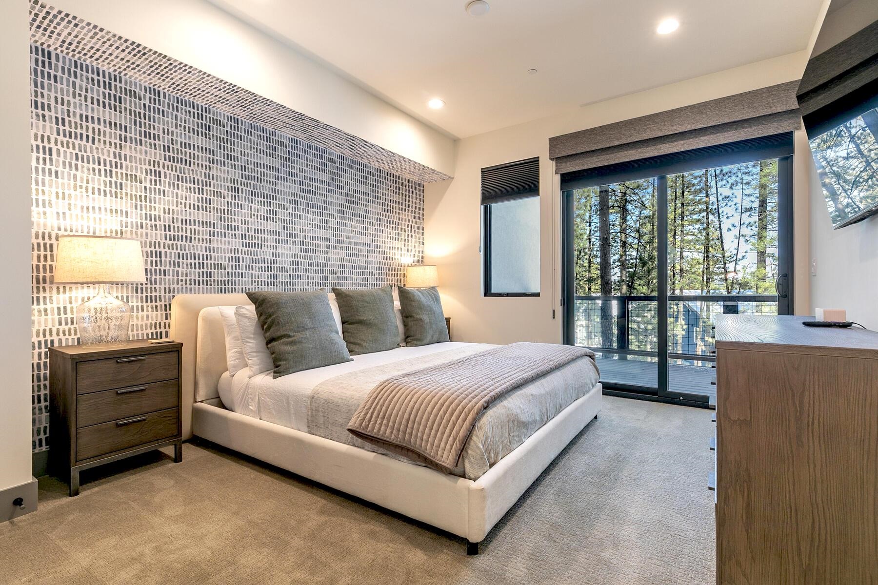 10316 Shady Lane Truckee, CA 96161 - Photo 3 of 21 a bedroom with a bed and a large window