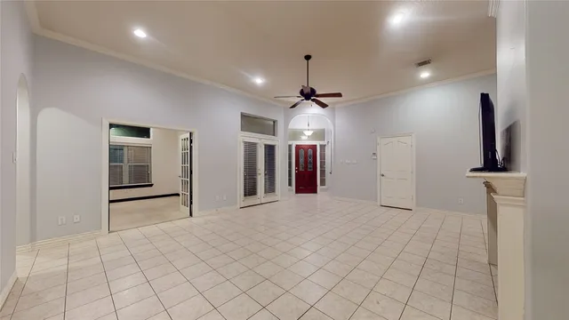 a view of a kitchen with a sink and a refrigerator