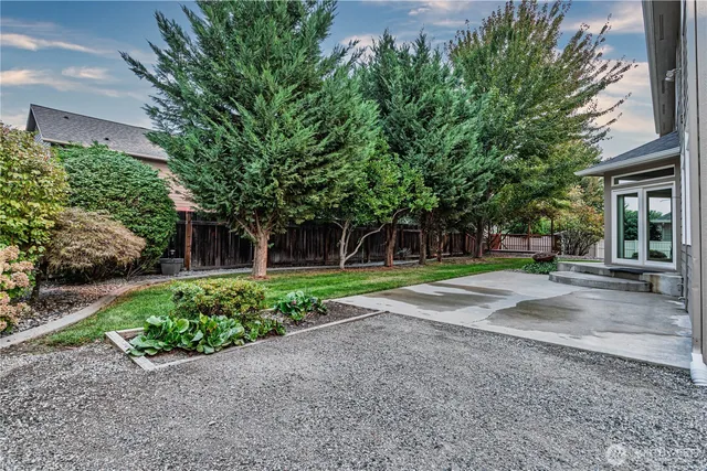 a view of a house with a street