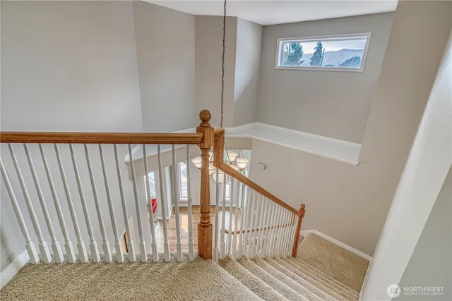 a view of staircase with white walls