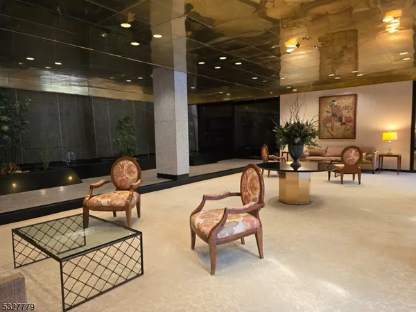 a outdoor living space with furniture and a potted plant