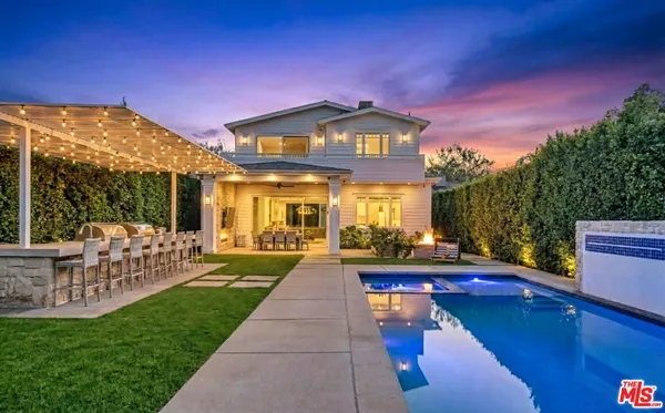 a view of a house with a swimming pool