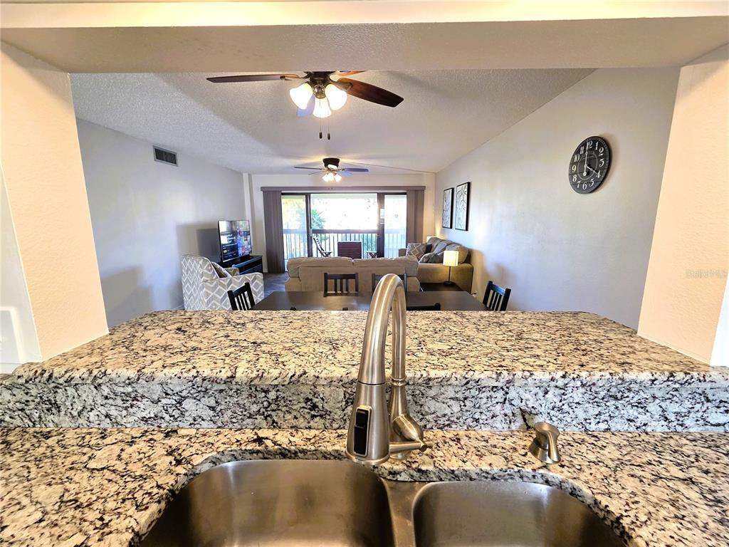 401 150th Avenue, Unit 223 Madeira Beach, FL 33708 - Photo 5 of 50 a bed room with a bed mirror and bedroom view