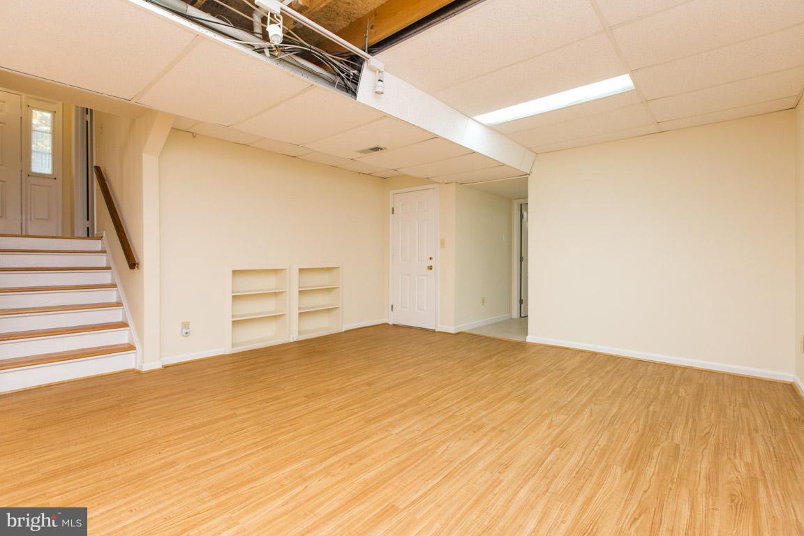 1 Cosgrave Court Silver Spring, MD 20902 - Photo 24 of 29 Spacious Rec Room with built-in shelving