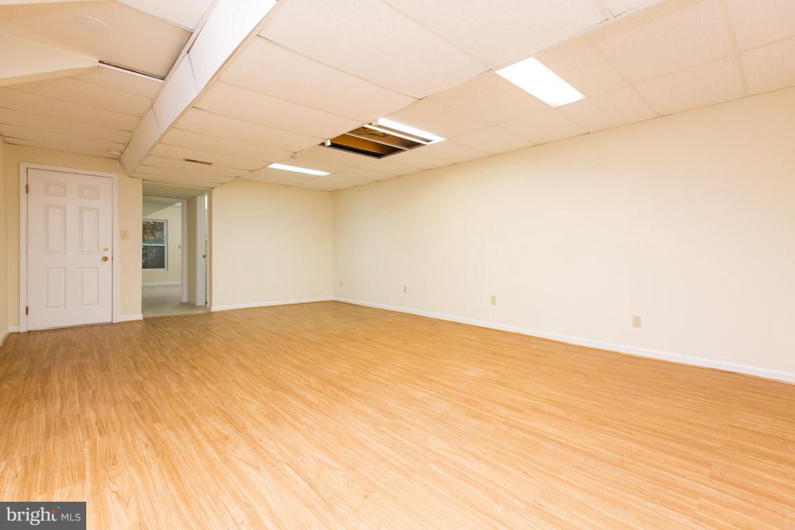 1 Cosgrave Court Silver Spring, MD 20902 - Photo 25 of 29 Rec Room with NEW flooring and ceiling