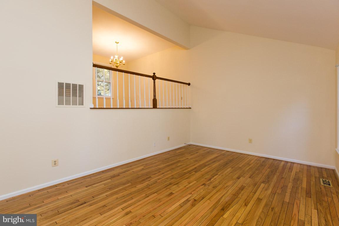 1 Cosgrave Court Silver Spring, MD 20902 - Photo 6 of 29 Spacious Living Room with Vaulted Ceiling