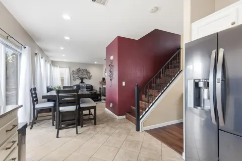 a bedroom with furniture and a window