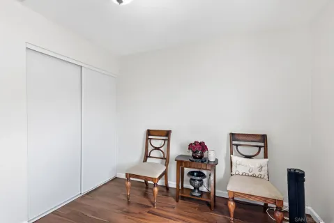 a bathroom with a bathtub sink and mirror